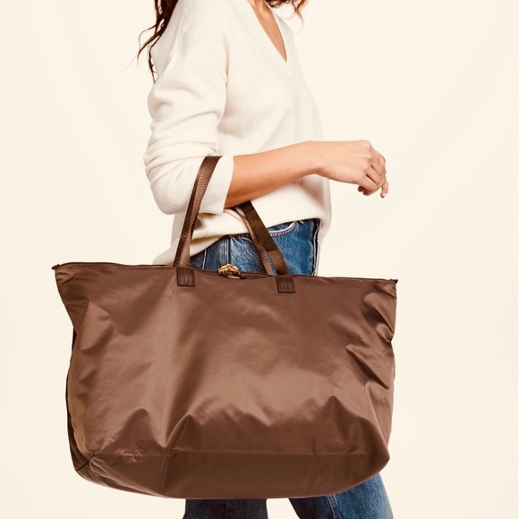 Tumi Handbags - ✈️ NWOT Tumi Just In Case Weekender + Pouch